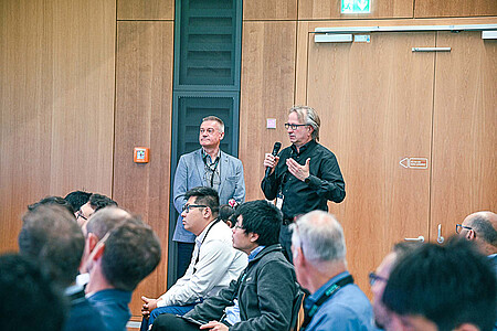 audience asking questions during presentation