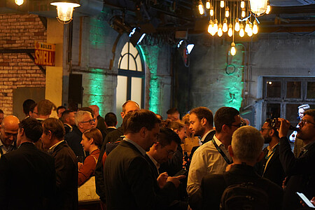 people talking at networking event